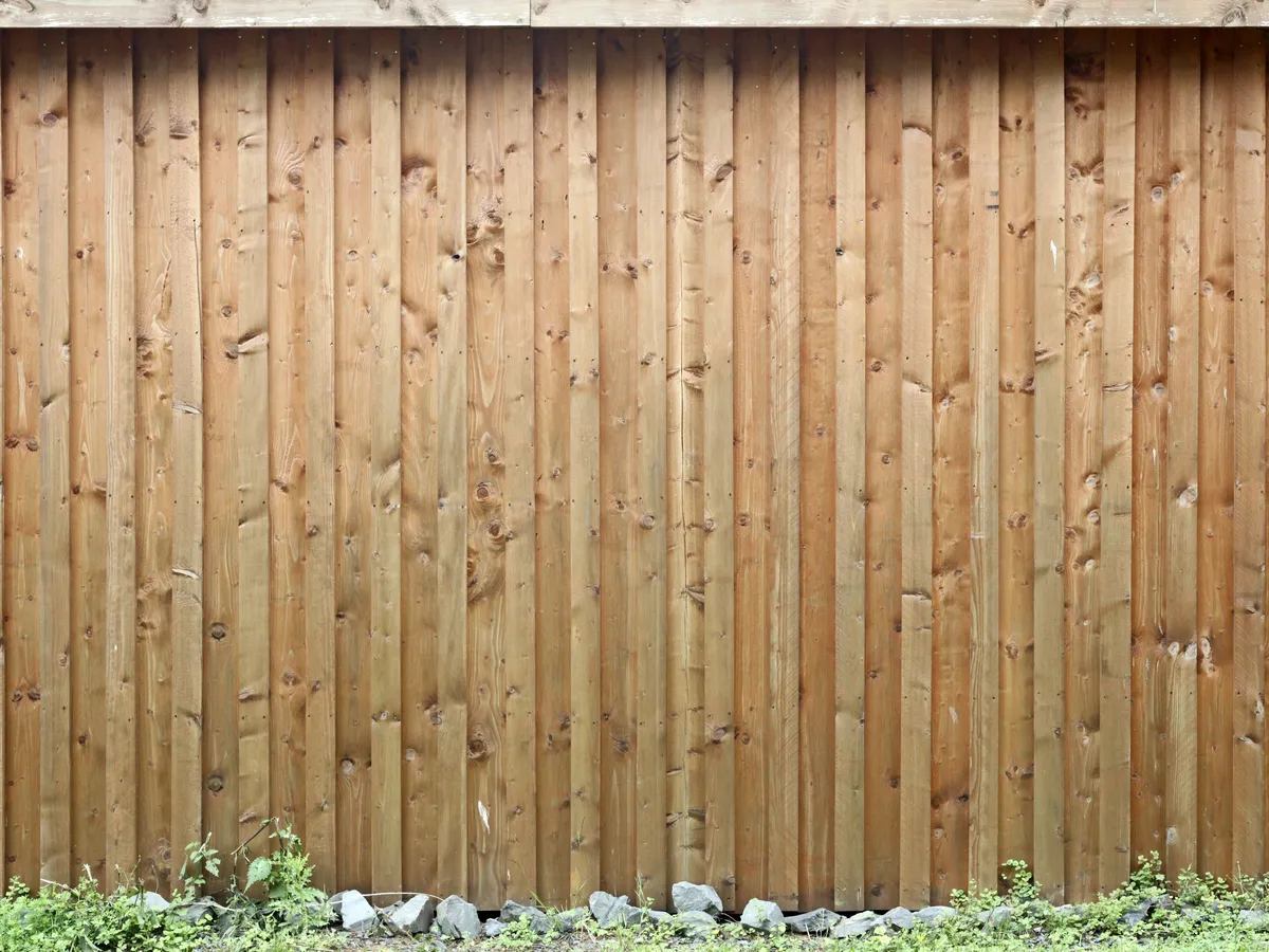 Fence boards replaced and stained